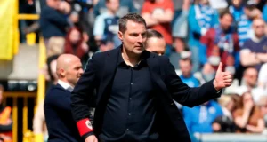 Brian Priske on the touchline during a match, linked with Rangers FC manager role