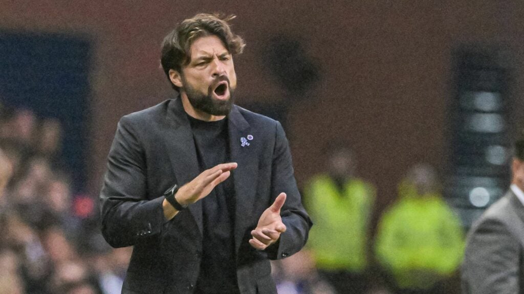 Russell Martin clapping on the Ibrox touchline